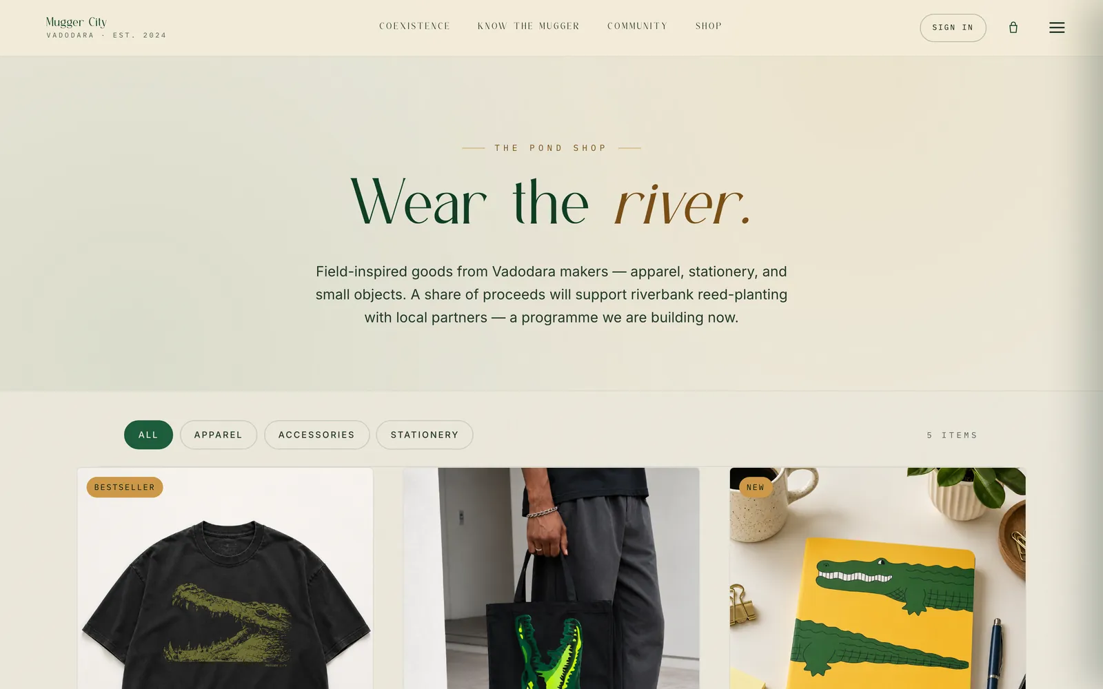 The Pond Shop: the headline Wear the river above a product grid of a field tee, a canvas tote and stationery, with category filters.