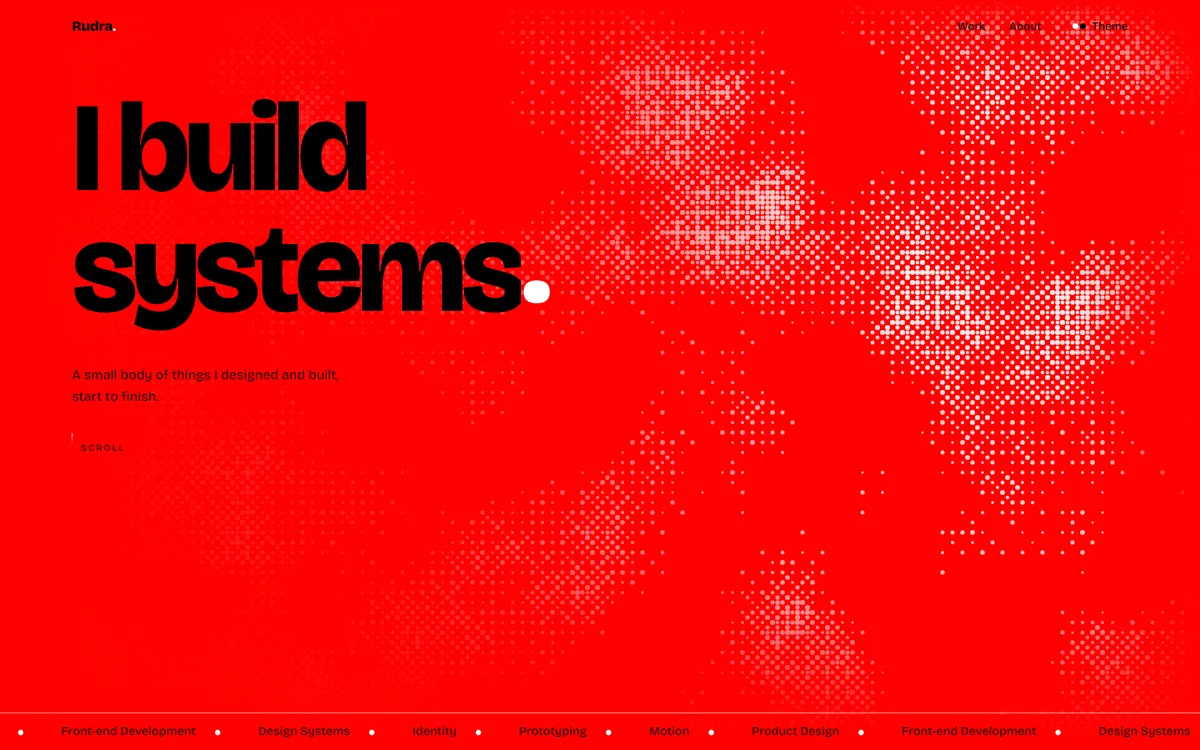 The current homepage headlined I build systems, over a field of white pixel-like marks on red.